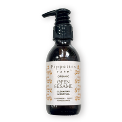 pump bottle of open sesame cleansing and body oil